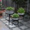 Saltoro Sherpi 21, 18, and 16 Inch 3 Piece Round Tub Metal Planter Set with Stand in Galvanized Gray and Black Iron-